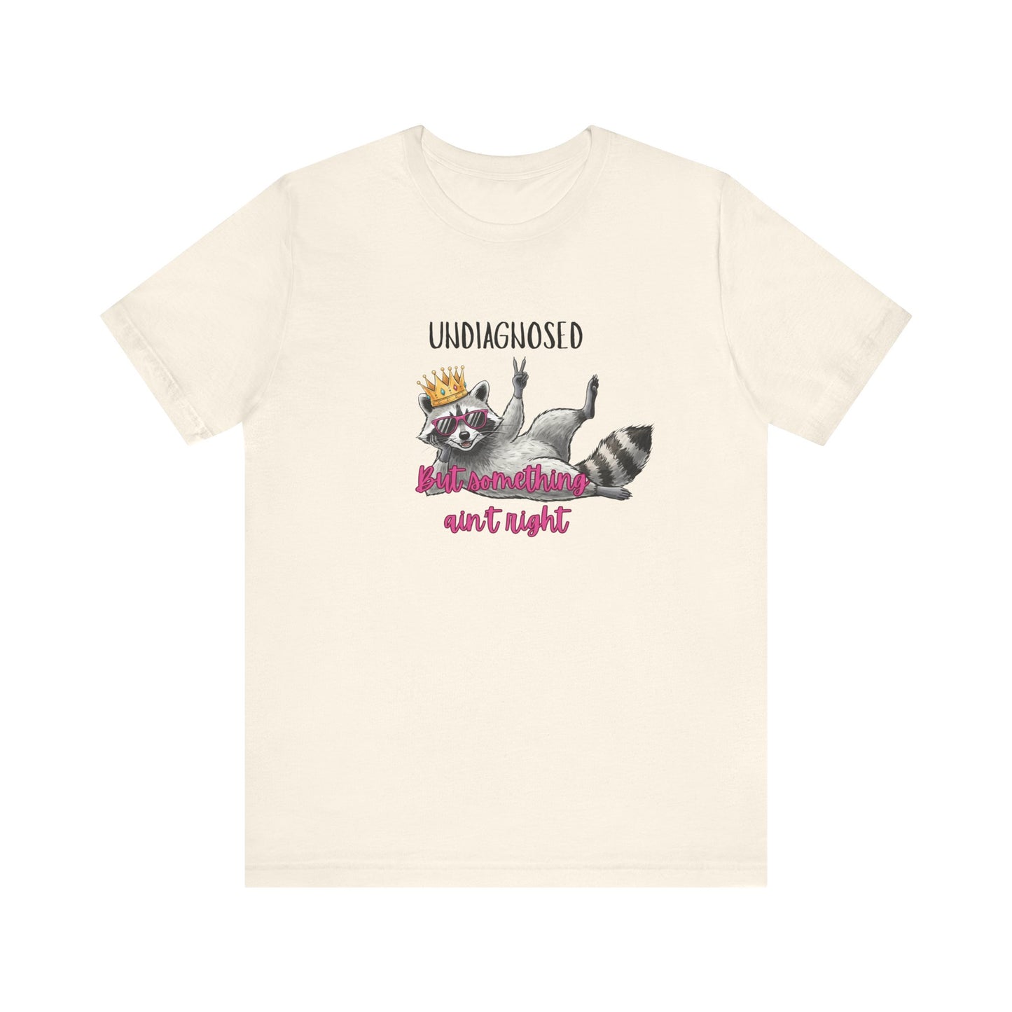 Funny Raccoon Graphic Tee – “Undiagnosed But Something Ain’t Right” T-Shirt, Quirky Meme Shirt, Casual Humor Tee, Trendy Streetwear Top