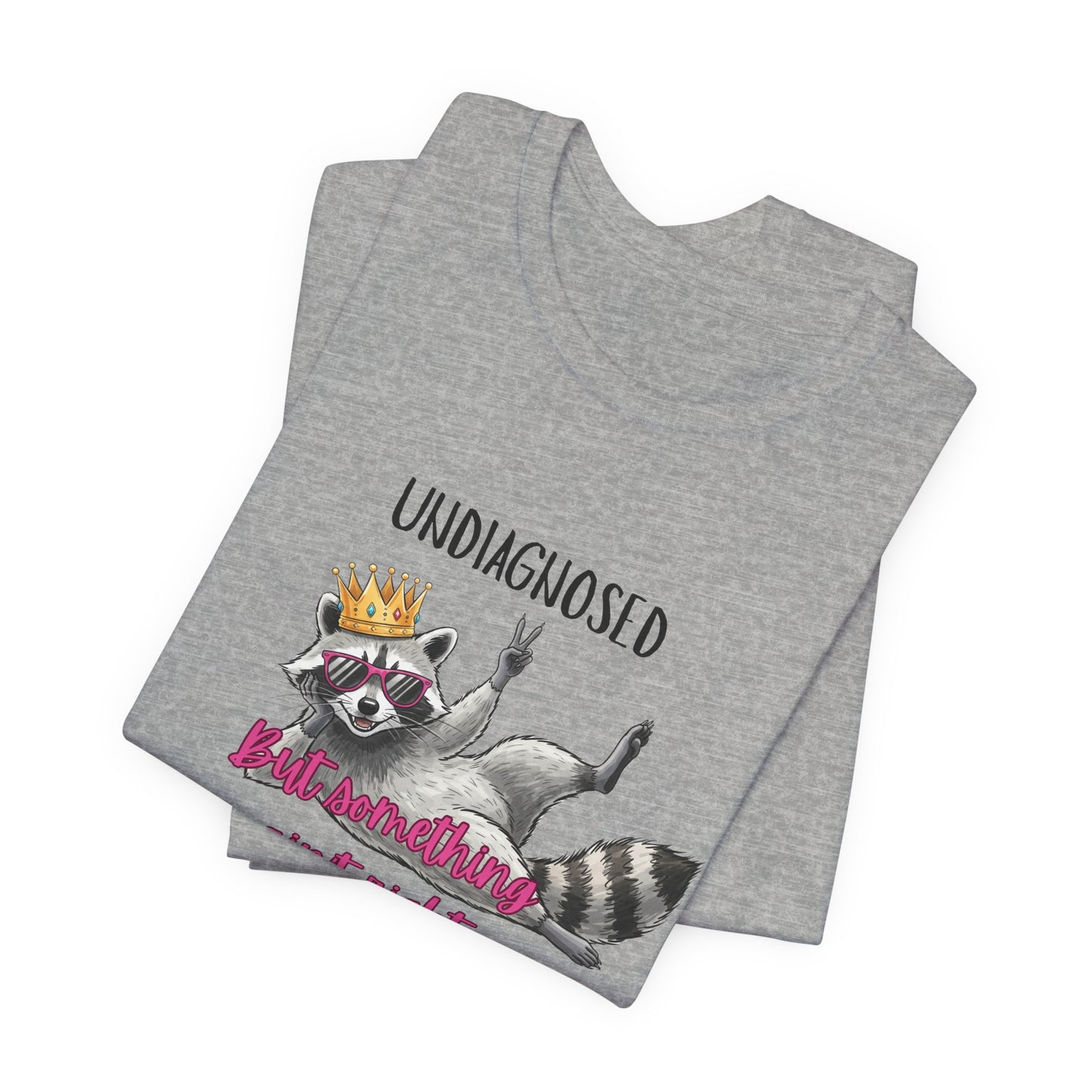 Funny Raccoon Graphic Tee – “Undiagnosed But Something Ain’t Right” T-Shirt, Quirky Meme Shirt, Casual Humor Tee, Trendy Streetwear Top