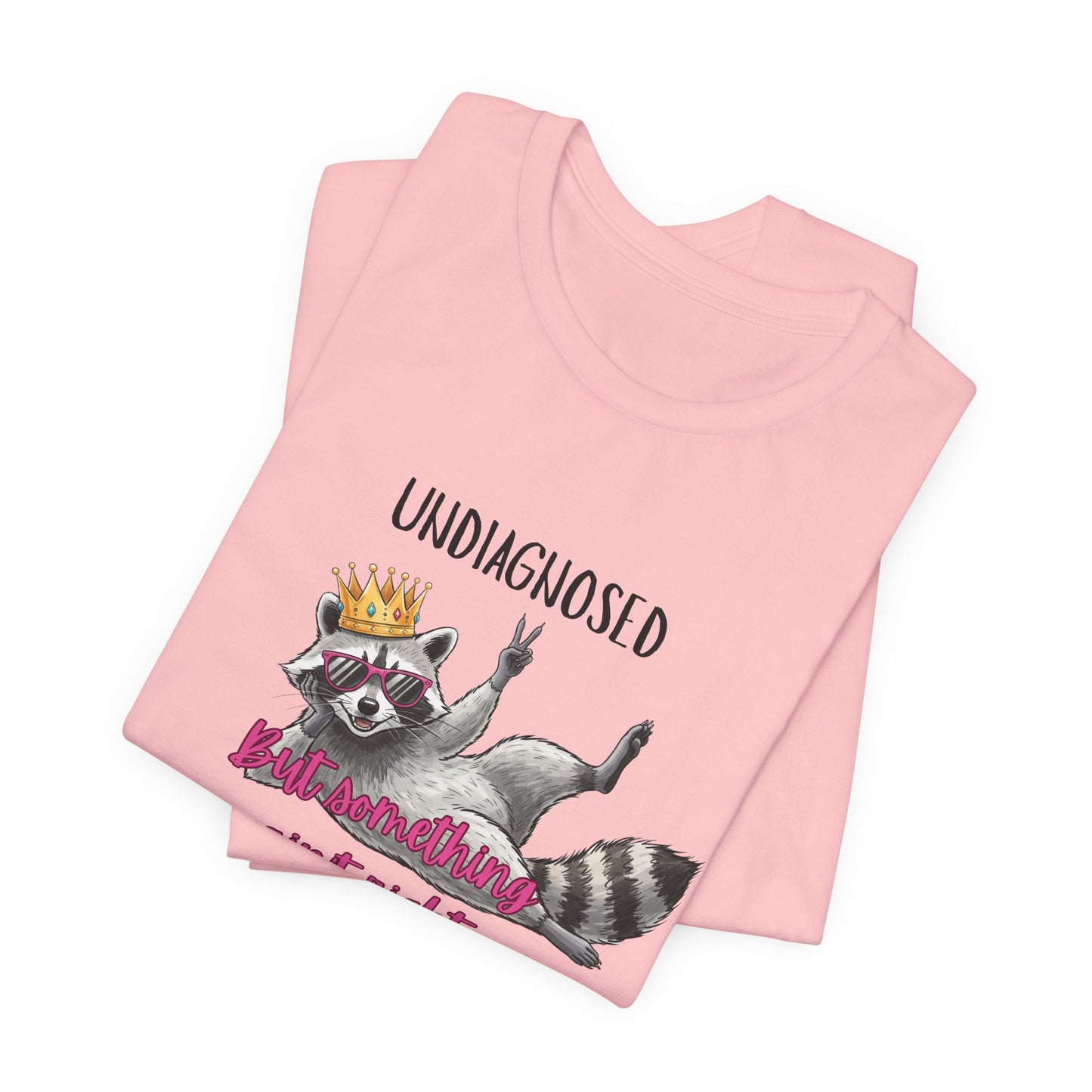 Funny Raccoon Graphic Tee – “Undiagnosed But Something Ain’t Right” T-Shirt, Quirky Meme Shirt, Casual Humor Tee, Trendy Streetwear Top