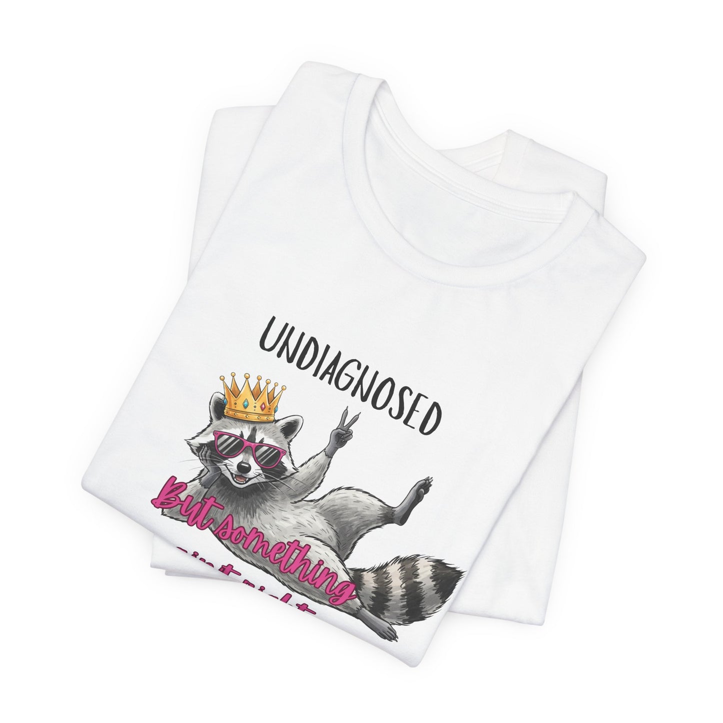 Funny Raccoon Graphic Tee – “Undiagnosed But Something Ain’t Right” T-Shirt, Quirky Meme Shirt, Casual Humor Tee, Trendy Streetwear Top